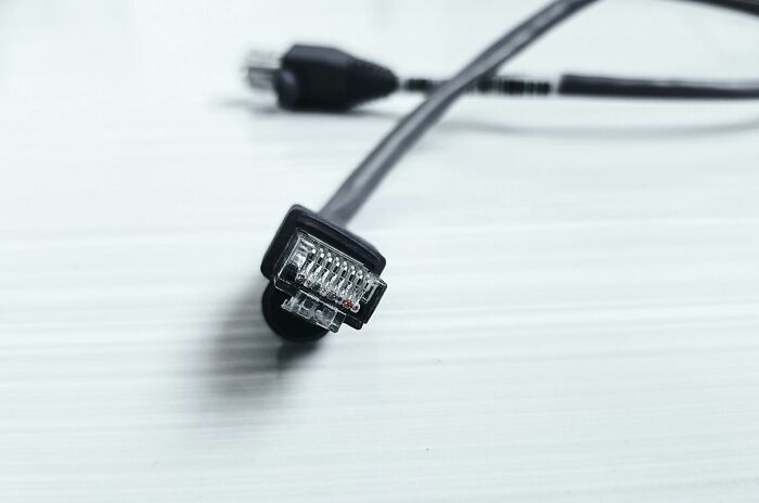 Cable connector on a white surface, highlighting technology skills people lack.