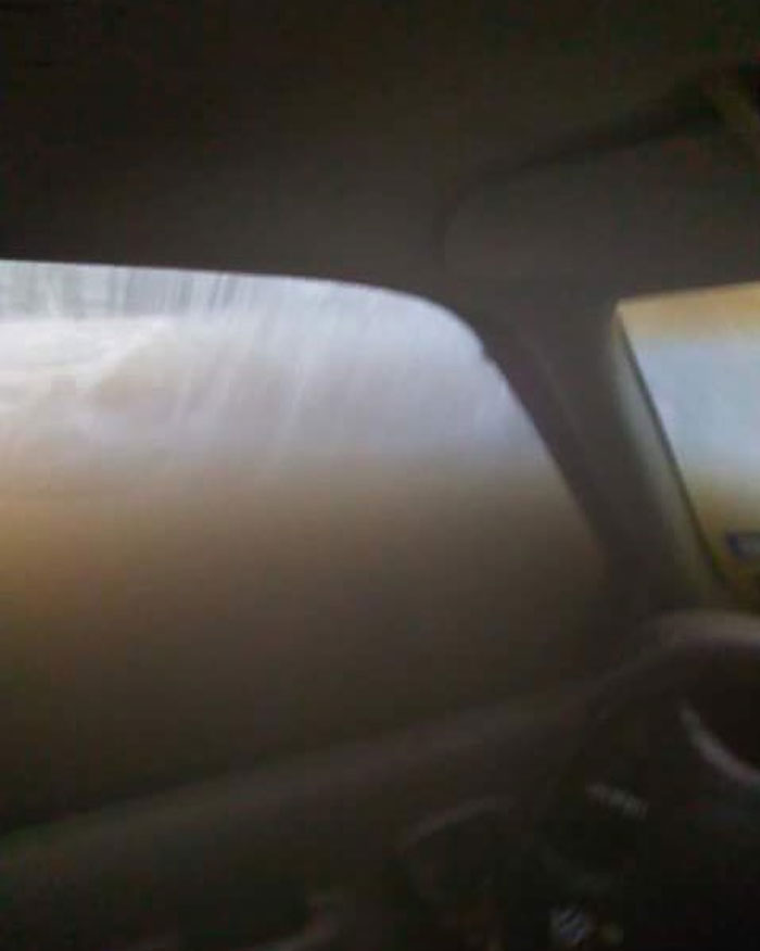 Car interior submerged in brown water, related to terrifying backstories.