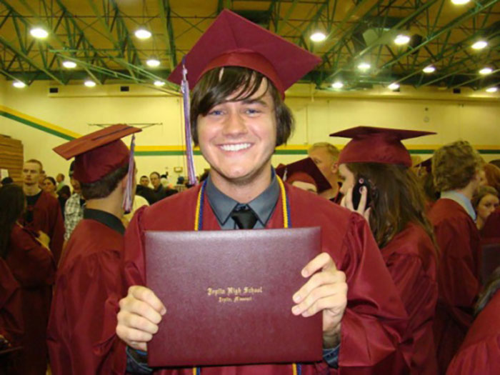 Graduate in cap and gown holds diploma, linked to photographs with terrifying backstories.