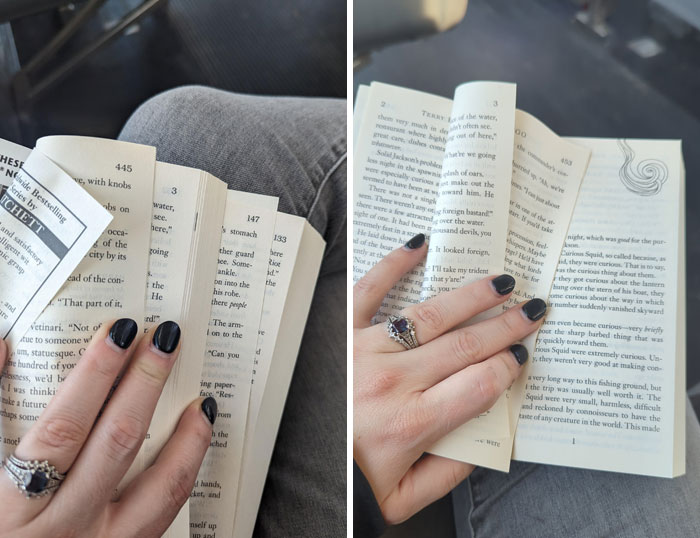Hands holding poorly designed books with overlapping page numbers in a casual setting.