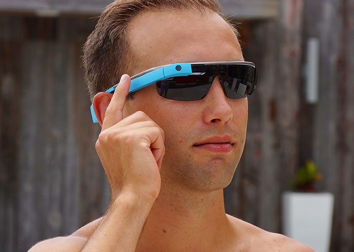 Person wearing smart glasses, showcasing innovative product that failed despite being good.