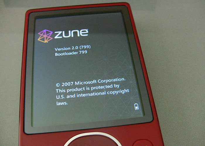 Red Zune media player displaying boot screen, one of the products that failed despite being good.