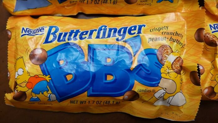 Butterfinger BB's candy packaging, a popular food item from the 90s and 2000s, featuring a cartoon character illustration.