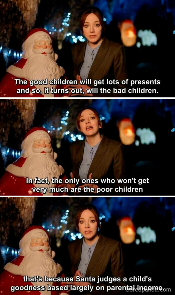 Woman explaining Santa parody in funny image, next to Santa statue.