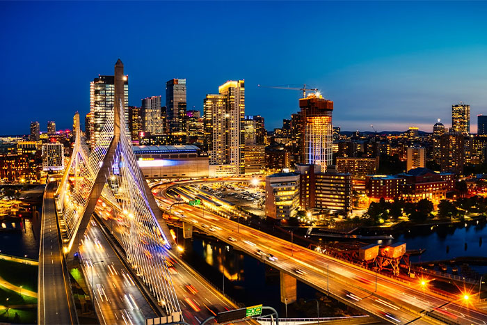 Night cityscape with a busy illuminated bridge and skyline, capturing a moment of realizing something was done the wrong way.