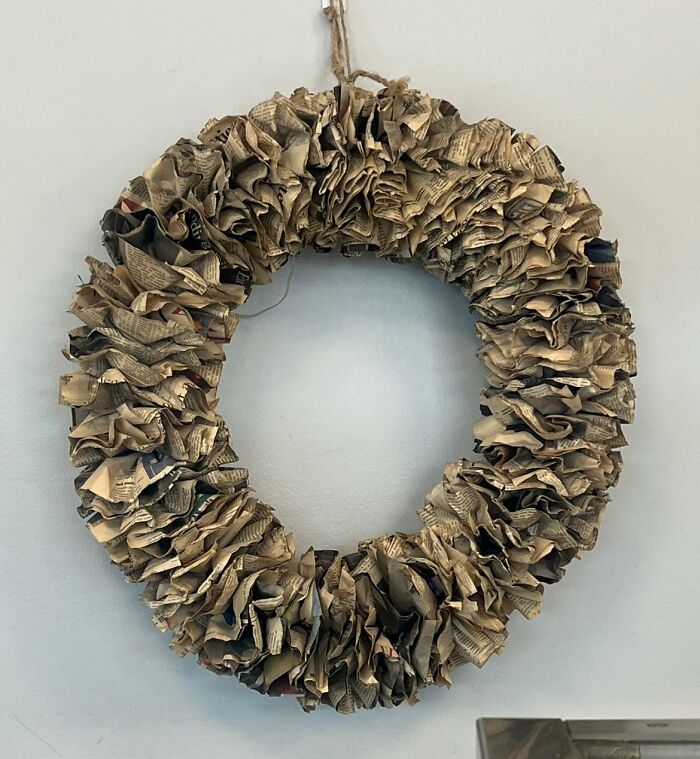Ruffled DIY wreath made of crumpled paper, depicting horrendous craft project.