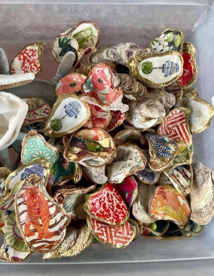 Decorated oyster shells with various colorful patterns, illustrating horrendous DIY crafts for shaming.