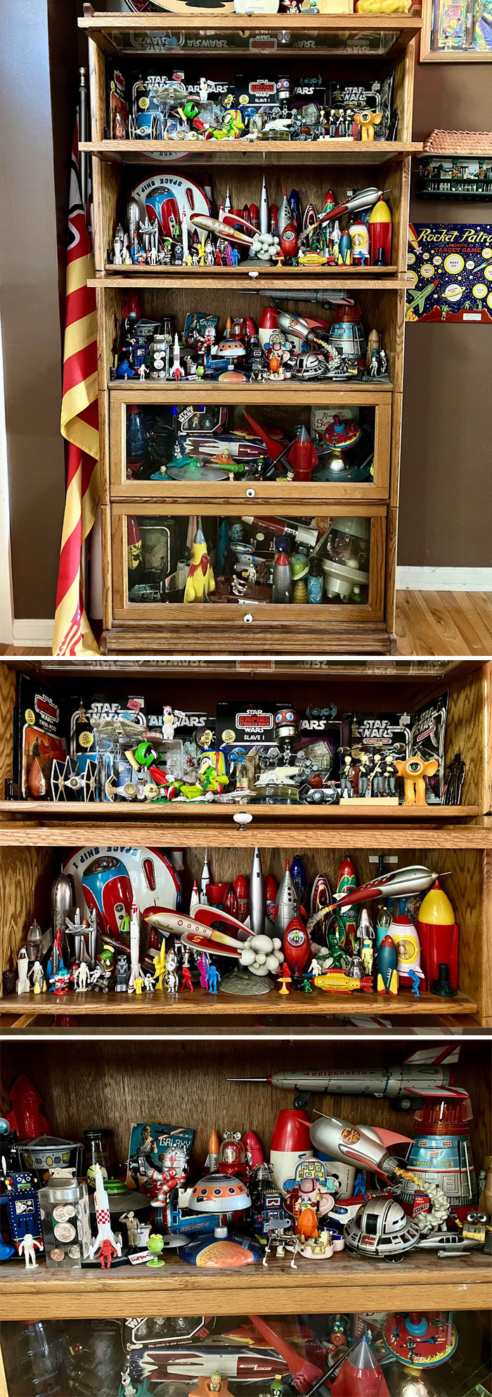 Vintage toy collection displayed on wooden shelves, featuring various retro space-themed toys and action figures.