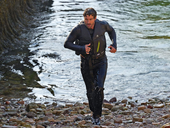 Brody Jenner in wet gear emerging from water, part of the Special Forces Season 3, showcasing resilience in extreme conditions.