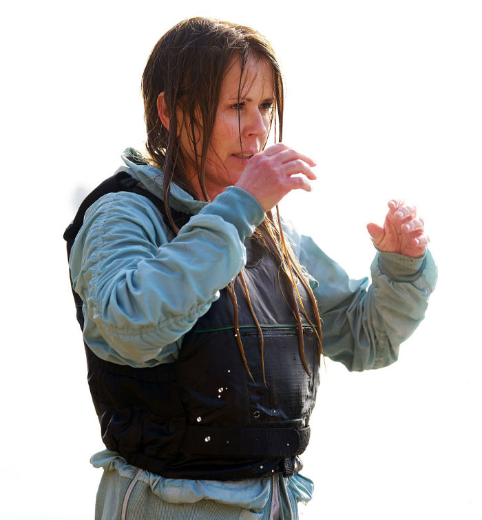 Trista Sutter in wet gear, facing challenge, representing Special Forces Season 3's tough test theme.