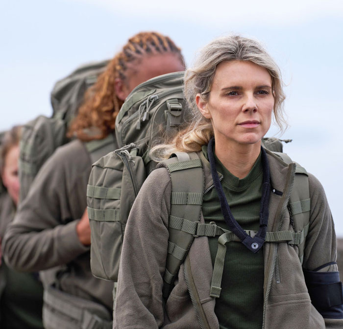 Participants including Alana Blanchard in Special Forces gear, facing a challenge outdoors.