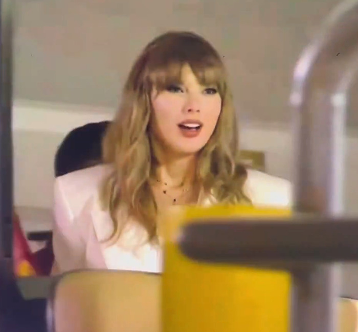 Taylor Swift in a white outfit at the Super Bowl.