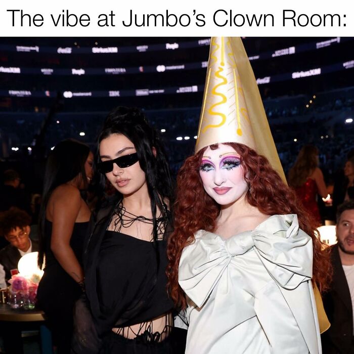 Two people in creative outfits at the 2025 Grammys, capturing the event's lively and playful atmosphere.