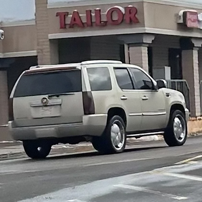 SUV involved in puppies theft parked near a tailor shop. SUV involved in puppies theft parked near a tailor shop.