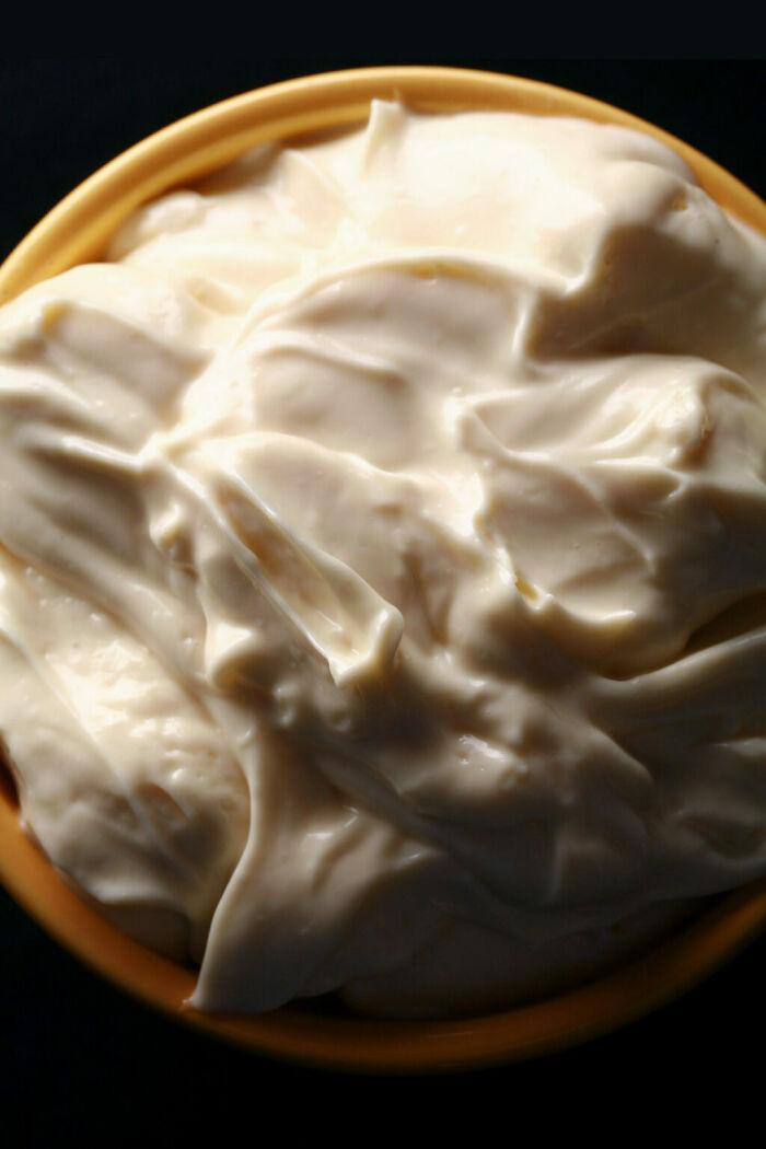 A bowl of creamy mayonnaise, a focus topic in the unpopular opinion poll discussion.