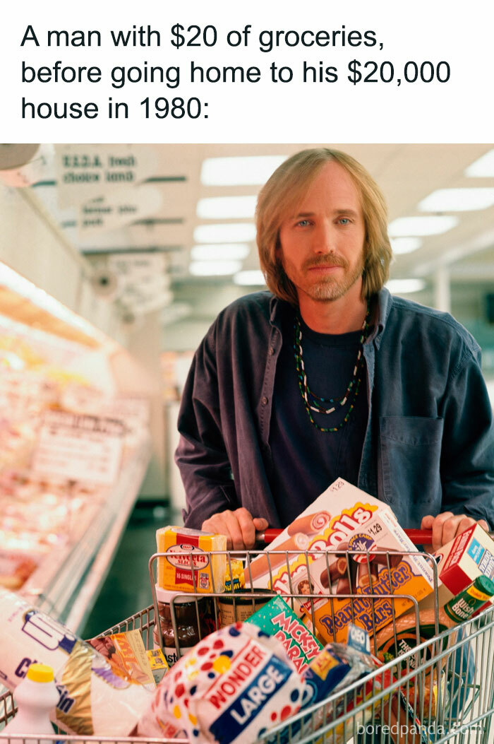 Man in grocery store with cart full, highlighting issues of capitalism in America.