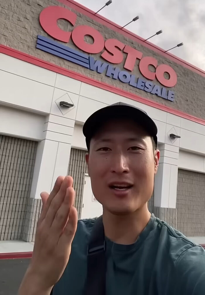 Person sharing Costco shopping hacks outside a Costco store.