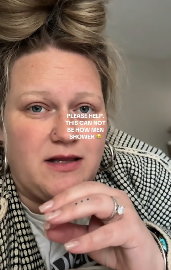 Woman reacting to a viral clip about how her husband showers, with text overlay expressing disbelief.