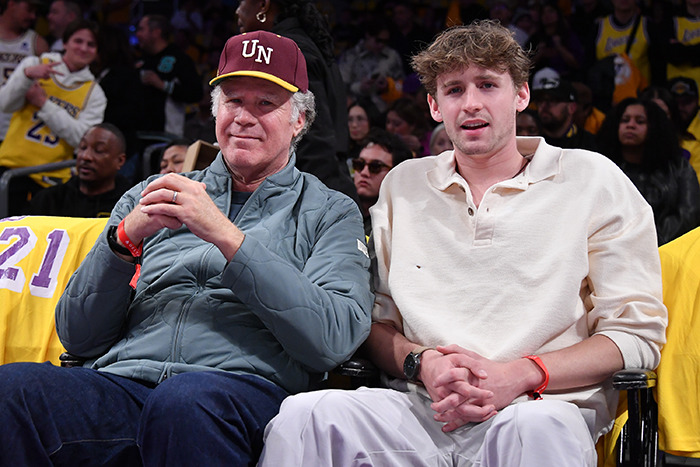 Magnus Ferrell and Will Ferrell enjoying a sports event.