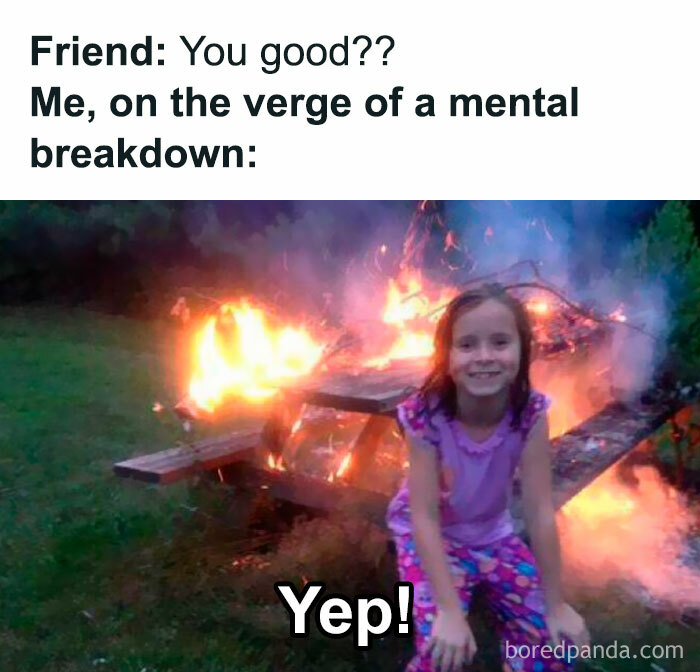 Girl smiling near a burning picnic table, representing a humorous mental breakdown meme from “Women Behaving Badly”.