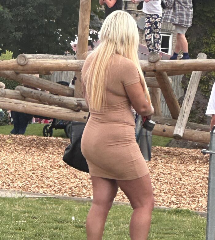 Woman with long blonde hair at a park, showcasing one of the hair fails.