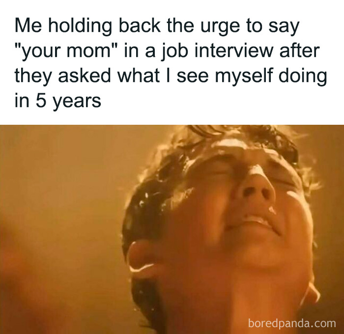 Man holding back laughter in job interview meme, relatable humor for men.