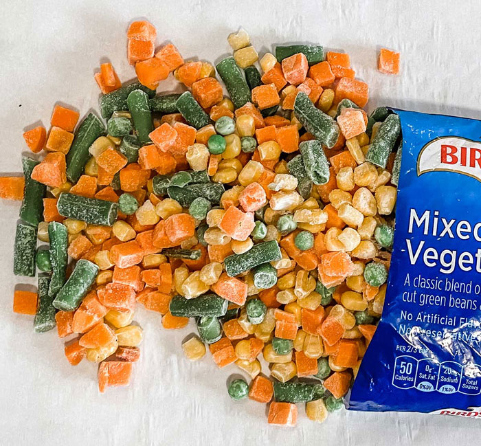 Frozen mixed vegetables from Birdseye, perfect for lazy meals with corn, peas, carrots, and green beans.