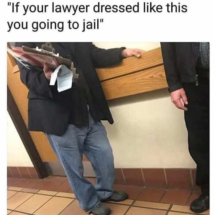 Funny meme of a casually dressed lawyer holding a clipboard in a hallway.