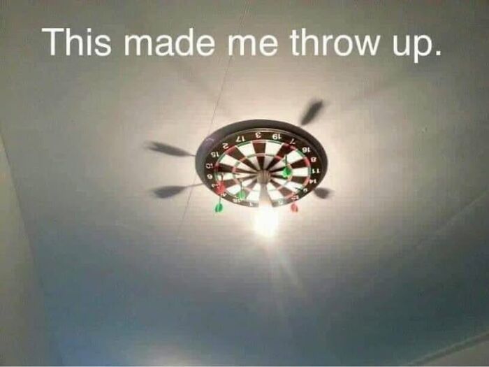Dartboard in place of a ceiling fan, part of a literal meme collection.