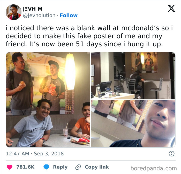 Person sits under a fake McDonald's poster of themselves, creatively blending in with the decor.