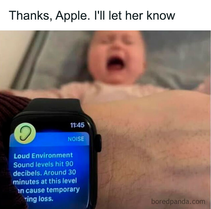Smartwatch noise alert reads 90 decibels with crying baby in the background. Humorous parenting meme.