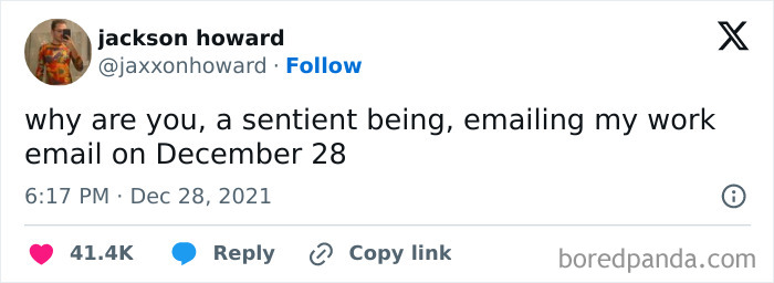A humorous tweet about receiving a work email on December 28, highlighting a relatable work-email-joke.