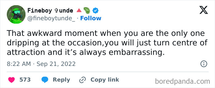 Tweet highlighting an awkward life moment of being the center of attraction at an event, with 573 likes.