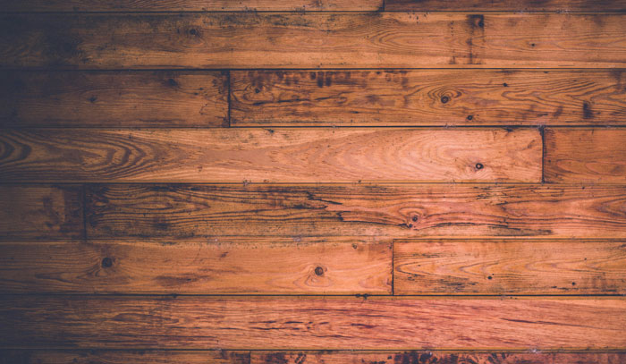 Wooden floorboards, potential home hiding spot.