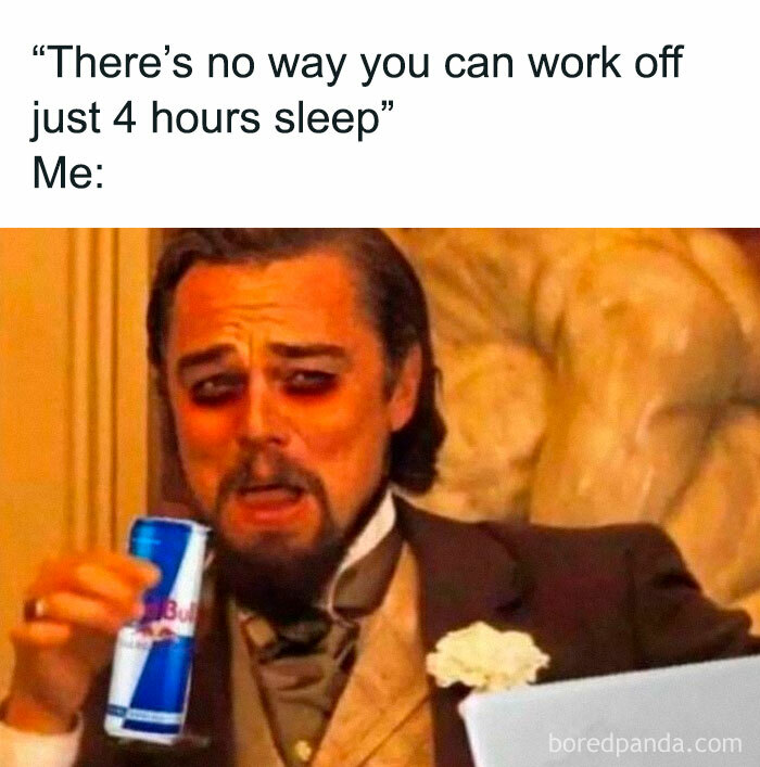 Man with tired eyes holding an energy drink, reflecting relatable job memes about working on minimal sleep.