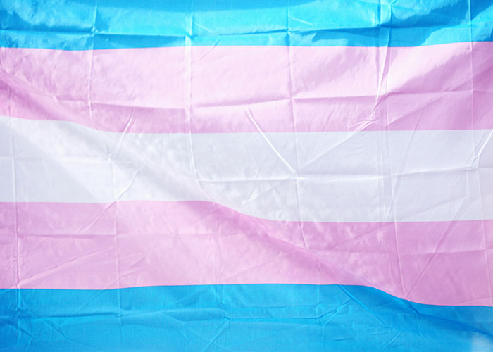Transgender pride flag symbolizing positive reactions to coming out.
