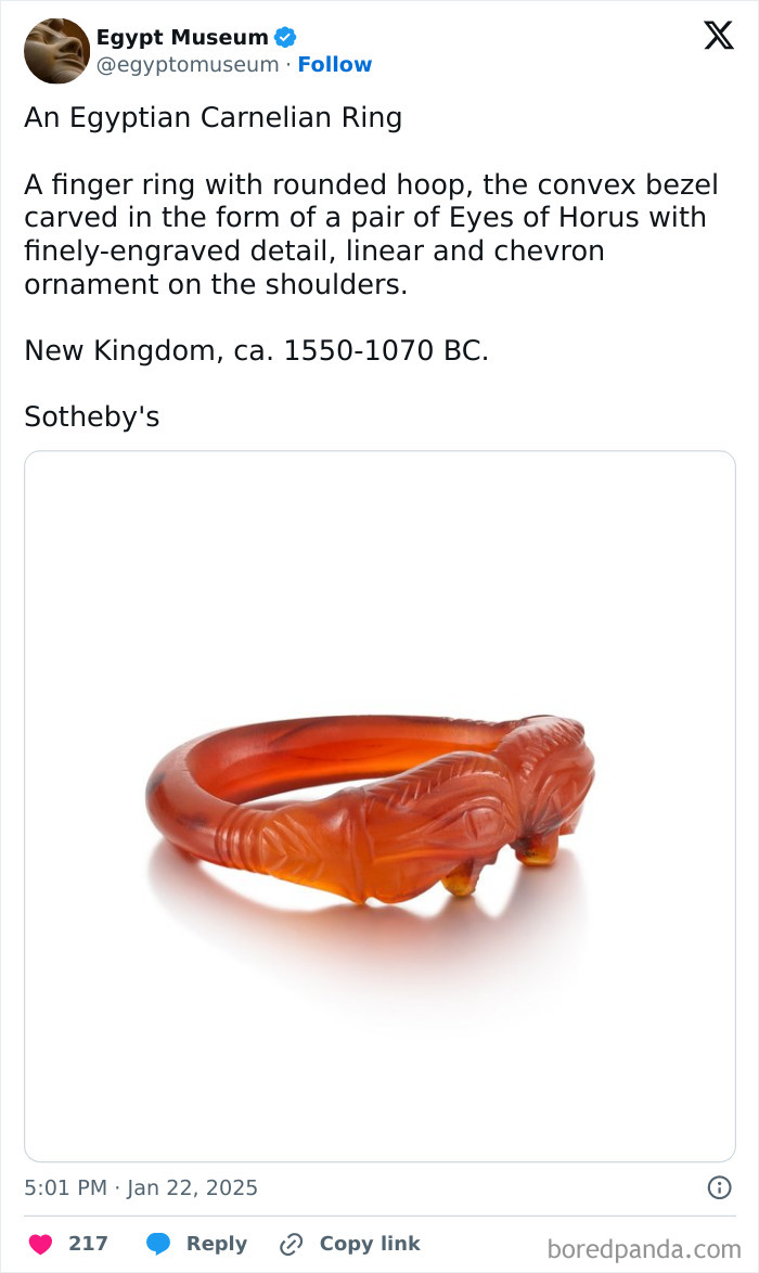 Ancient Egyptian carnelian ring with Eyes of Horus engraving, New Kingdom era, showcasing detailed craftsmanship.