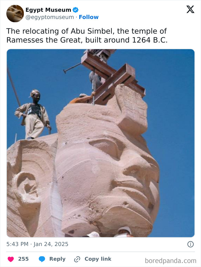 Workers relocating the ancient Egyptian Abu Simbel statue of Ramesses the Great, highlighting its magnificence.