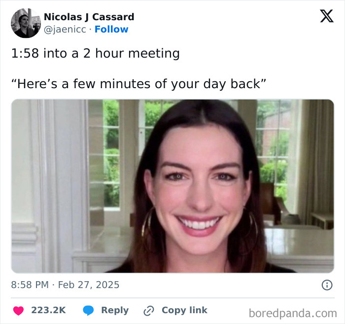 Woman smiling during a meeting, adds humor to a tweet about long work meetings.
