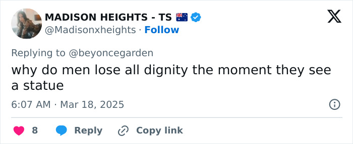 Tweet questioning men's behavior around statues, sparking debate on dignity and respect.