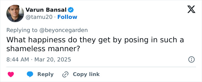 Tweet by a user questioning tourists' behavior with a female statue, sparking heated debate.