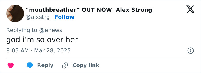 Tweet from user reacting to JoJo Siwa's new shaved rainbow style, expressing disinterest.