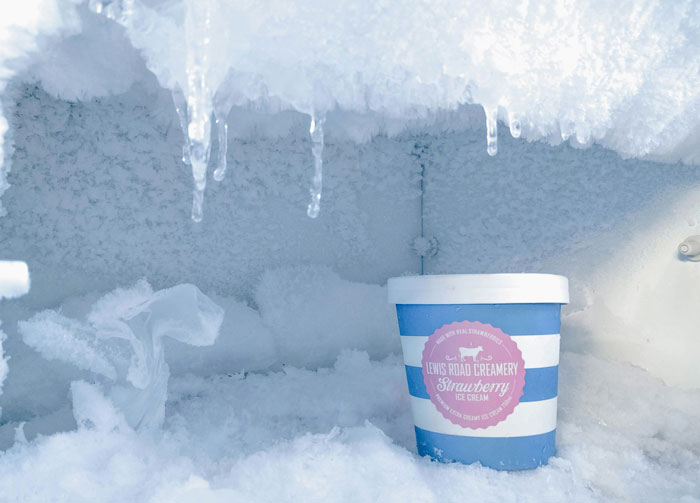 Ice cream container in a freezer, showcasing a favorite home hiding spot.