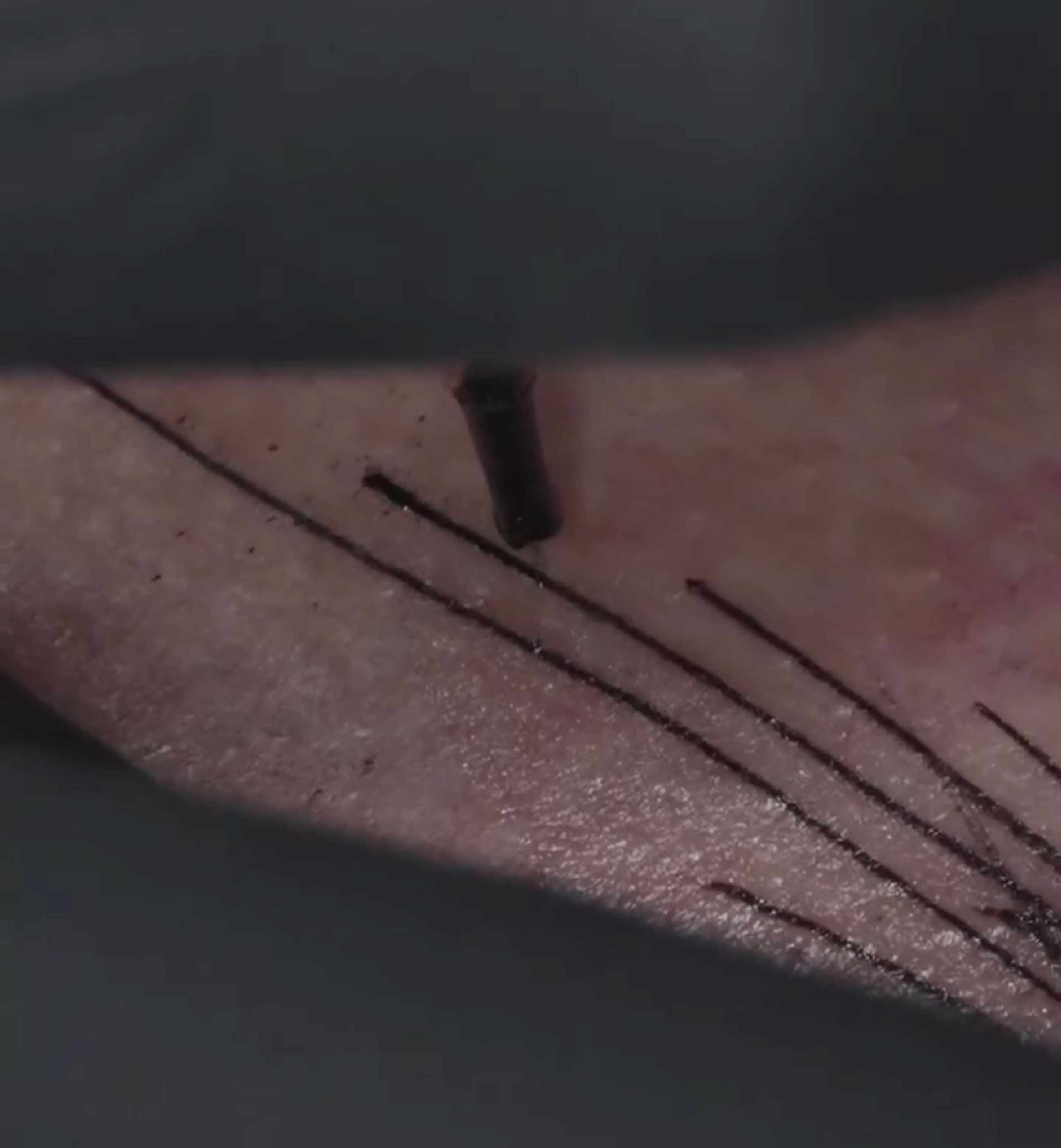 Tattoo artist inks unique brain activity imprint on skin.