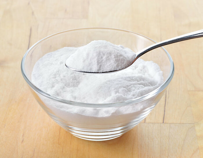 A bowl of white powder with a spoon, related to sudden dizziness awareness.