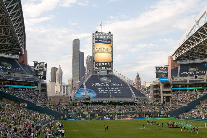 Qwest Field stadium filled with fans during a soccer match, one of the iconic cathedrals of soccer.