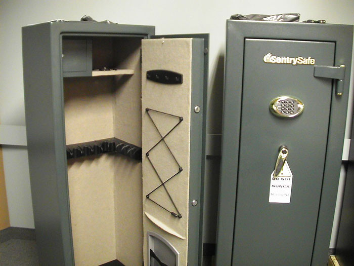 A gun safe with open and closed doors, showcasing interior storage typical in American homes.