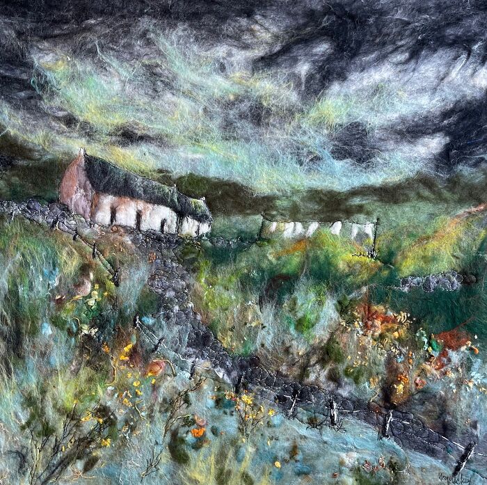 Fiber art scenery depicting a rustic landscape with a house, showcasing Moy Mackay's unique fiber artwork technique.