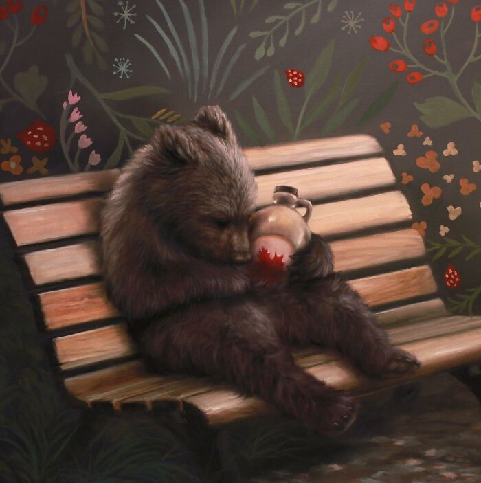 A bear holding a maple syrup bottle on a bench, representing anthropomorphic artwork by Richard Ahnert.