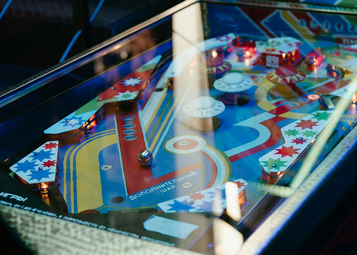 Vintage pinball machine with colorful design, reflecting Gen X nostalgia for life without social media.